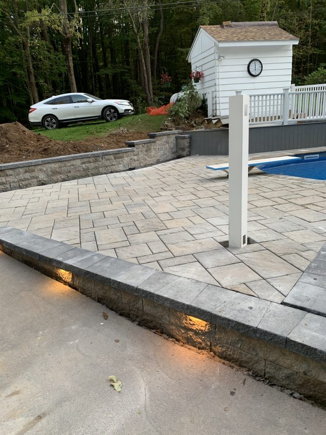 pool deck installation, front porch pavers, residential walkways, outdoor living spaces, patio design, paver driveways