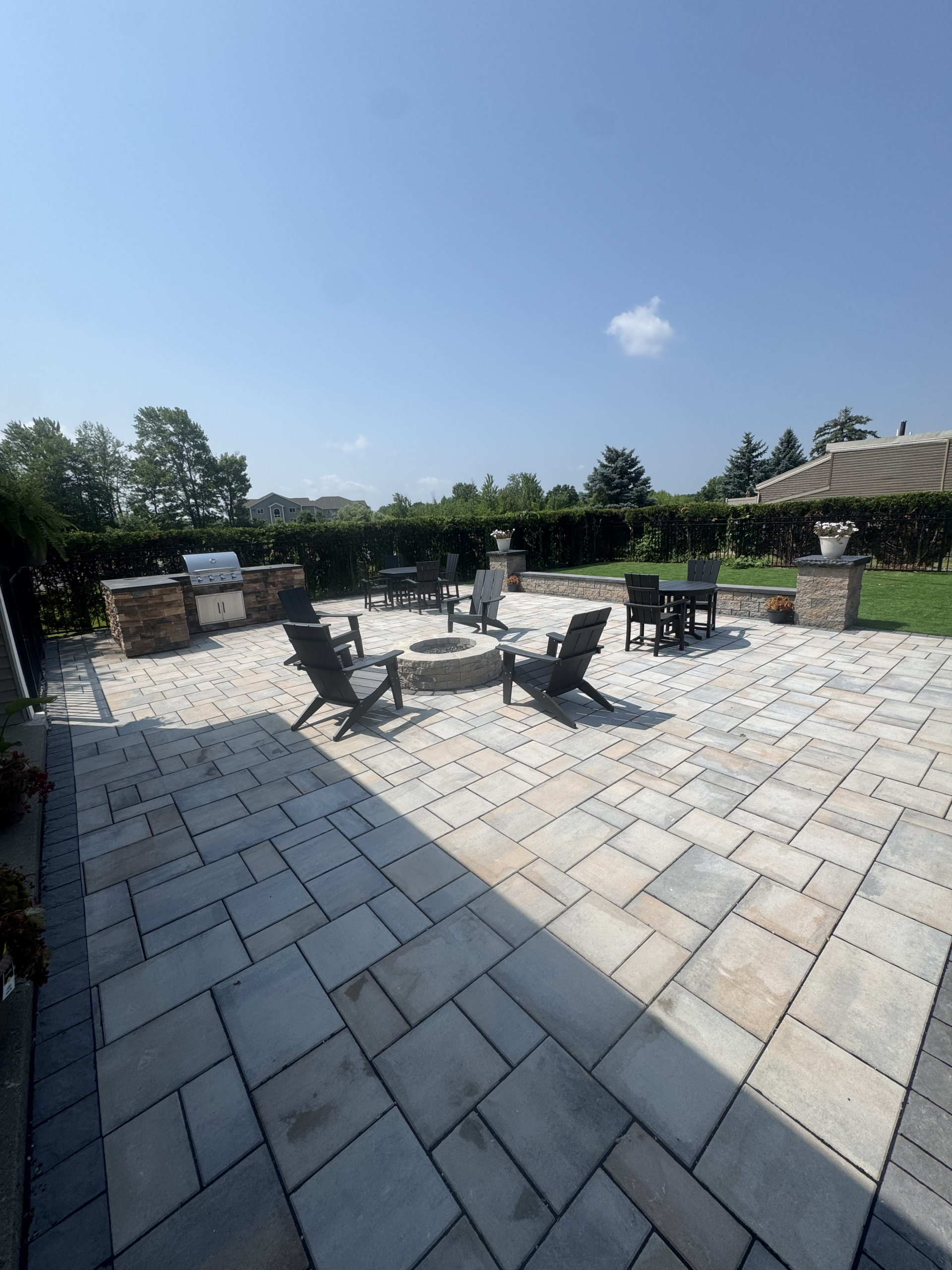 Finished concrete paver pool deck in Central New York